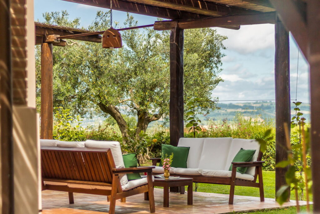 Seats overlooking Tuscan countryside at a villa